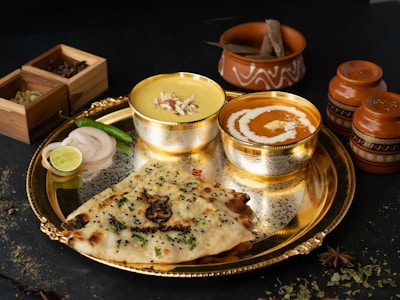 Indian food served on a traditional platter