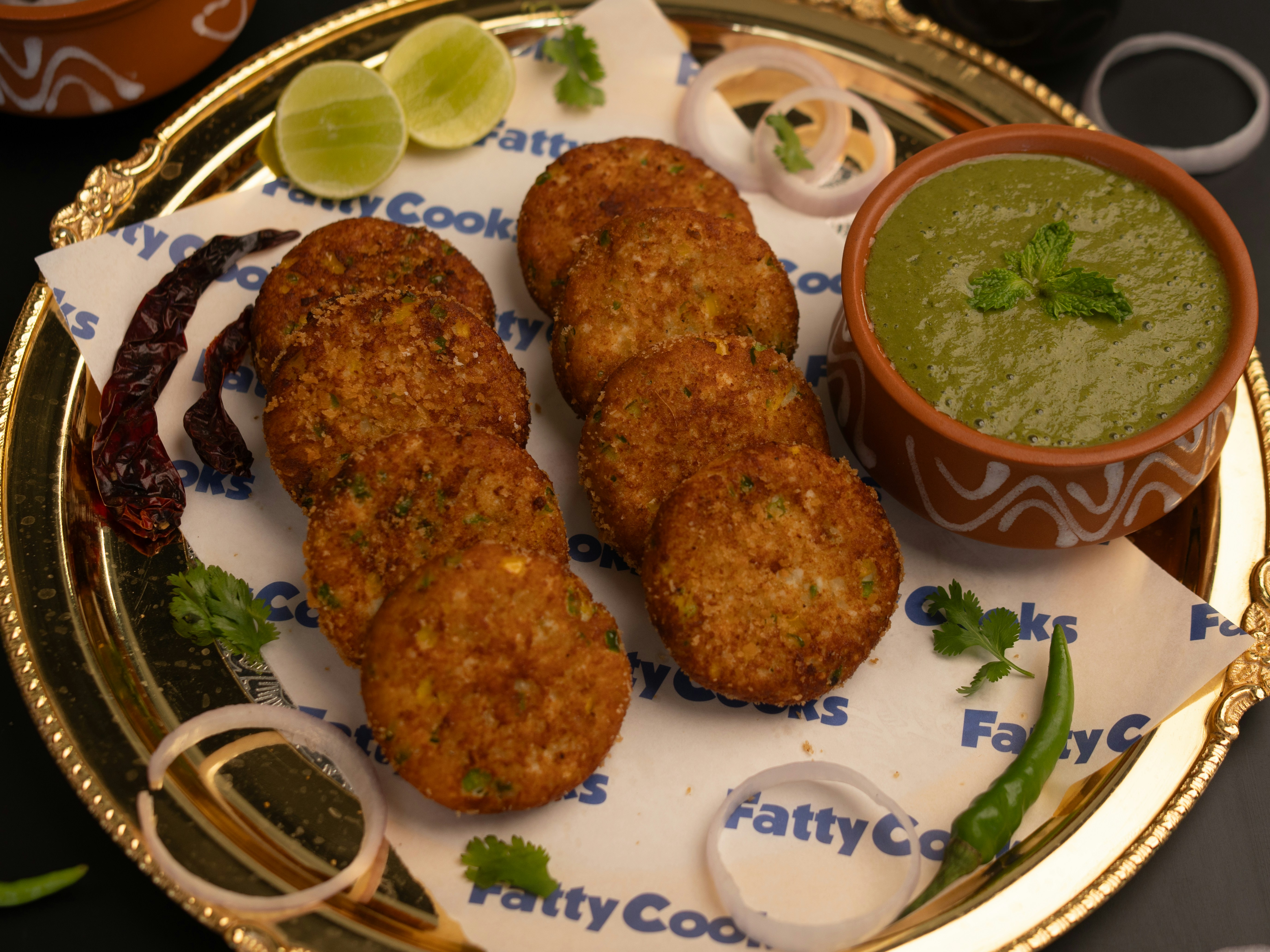 mini vegetable cutlets and paneer bites served on a tray - indian vegetarian finger foods