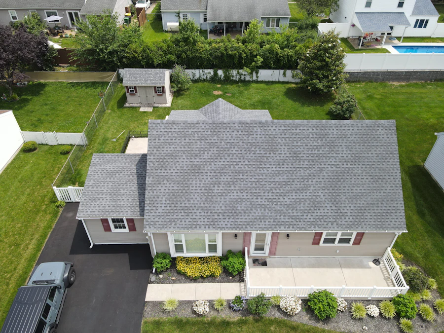 Fresh asphalt shingle roof on a suburban home