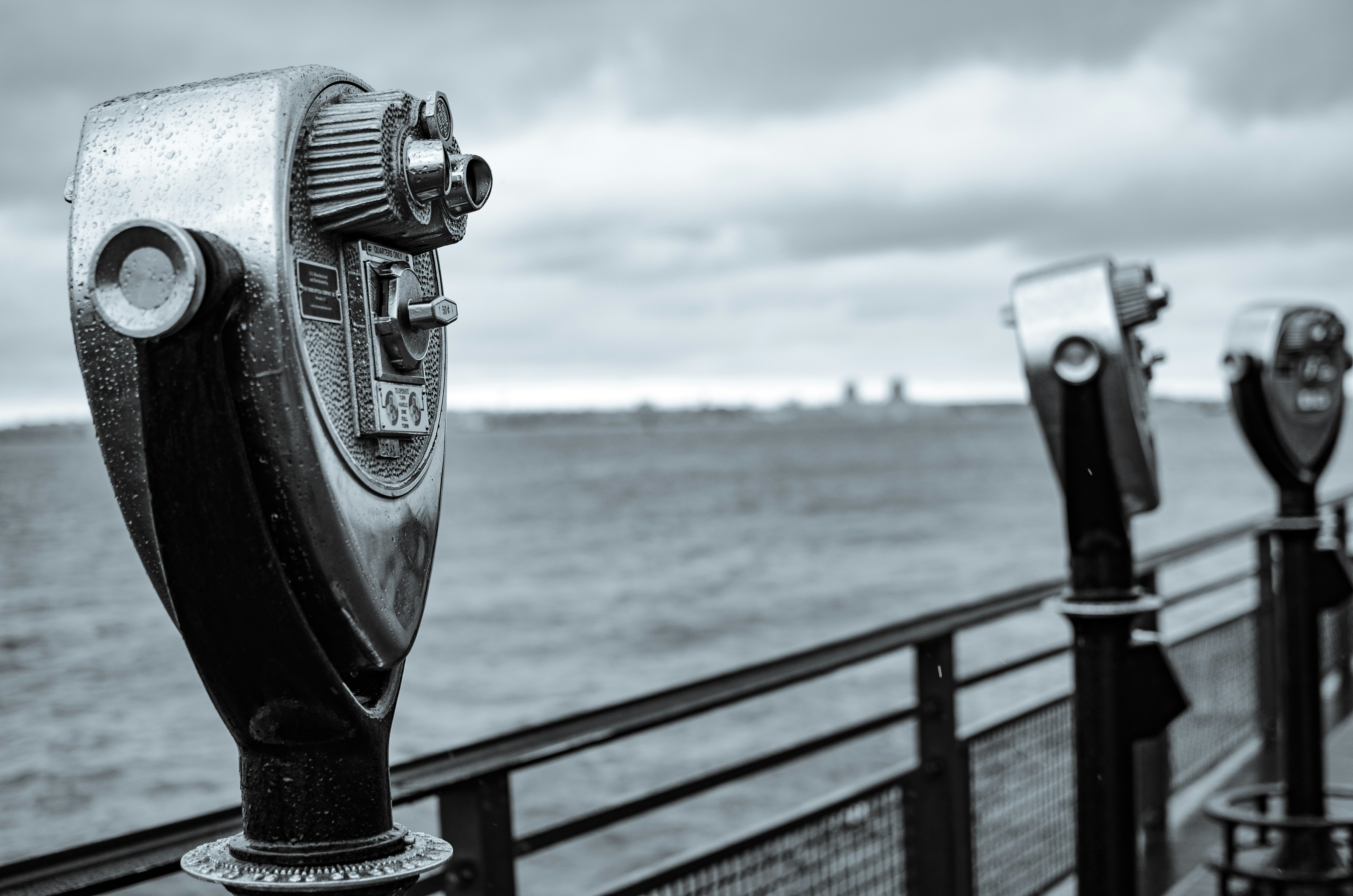 Binoculars on a pier overlooking the ocean