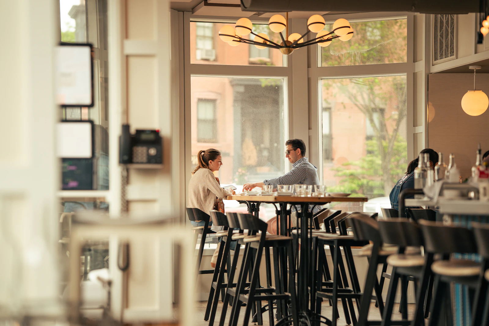 Mature couple talking over coffee on a relaxed date after 50