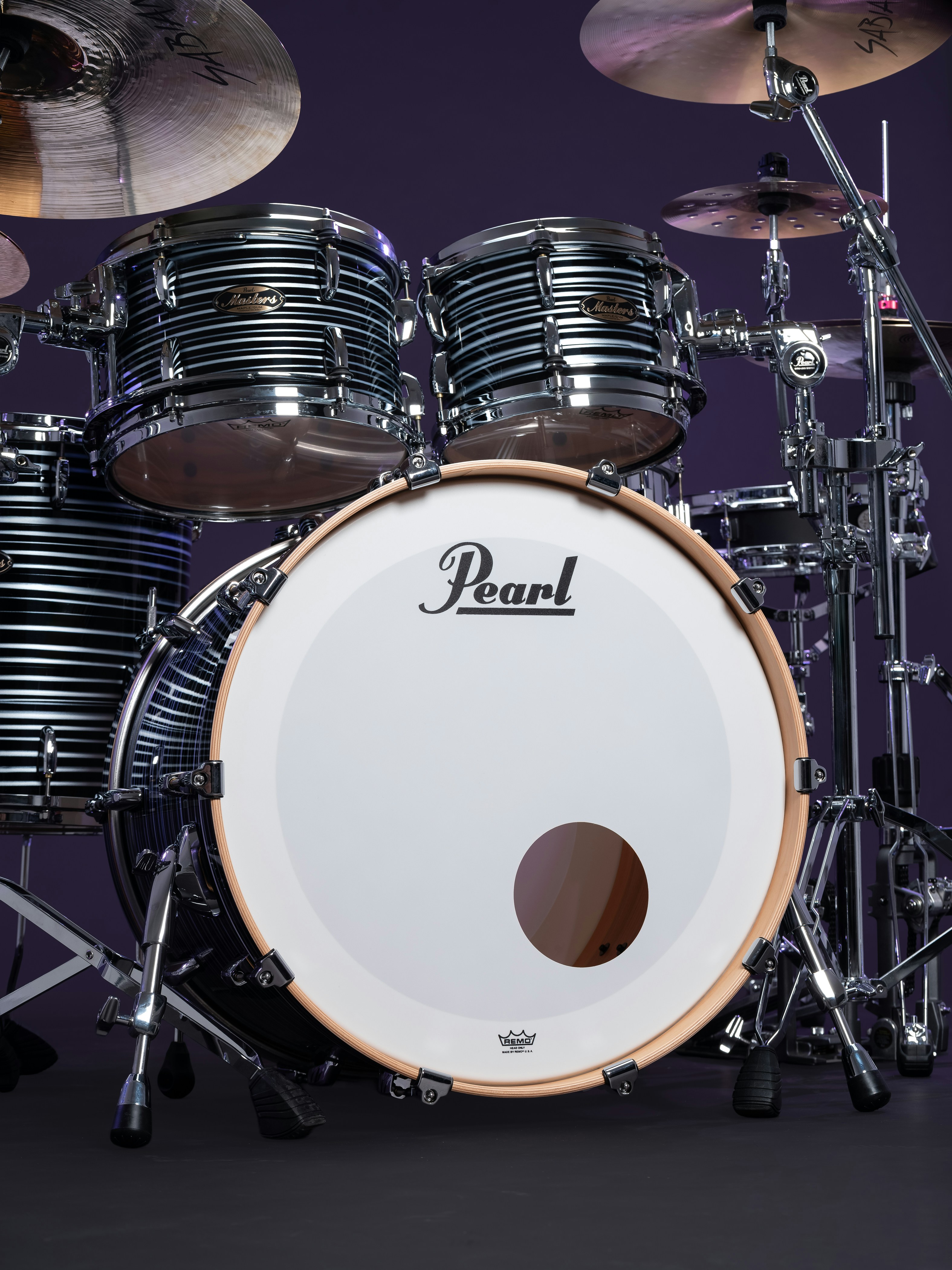 A drum kit with a white bass drum head
