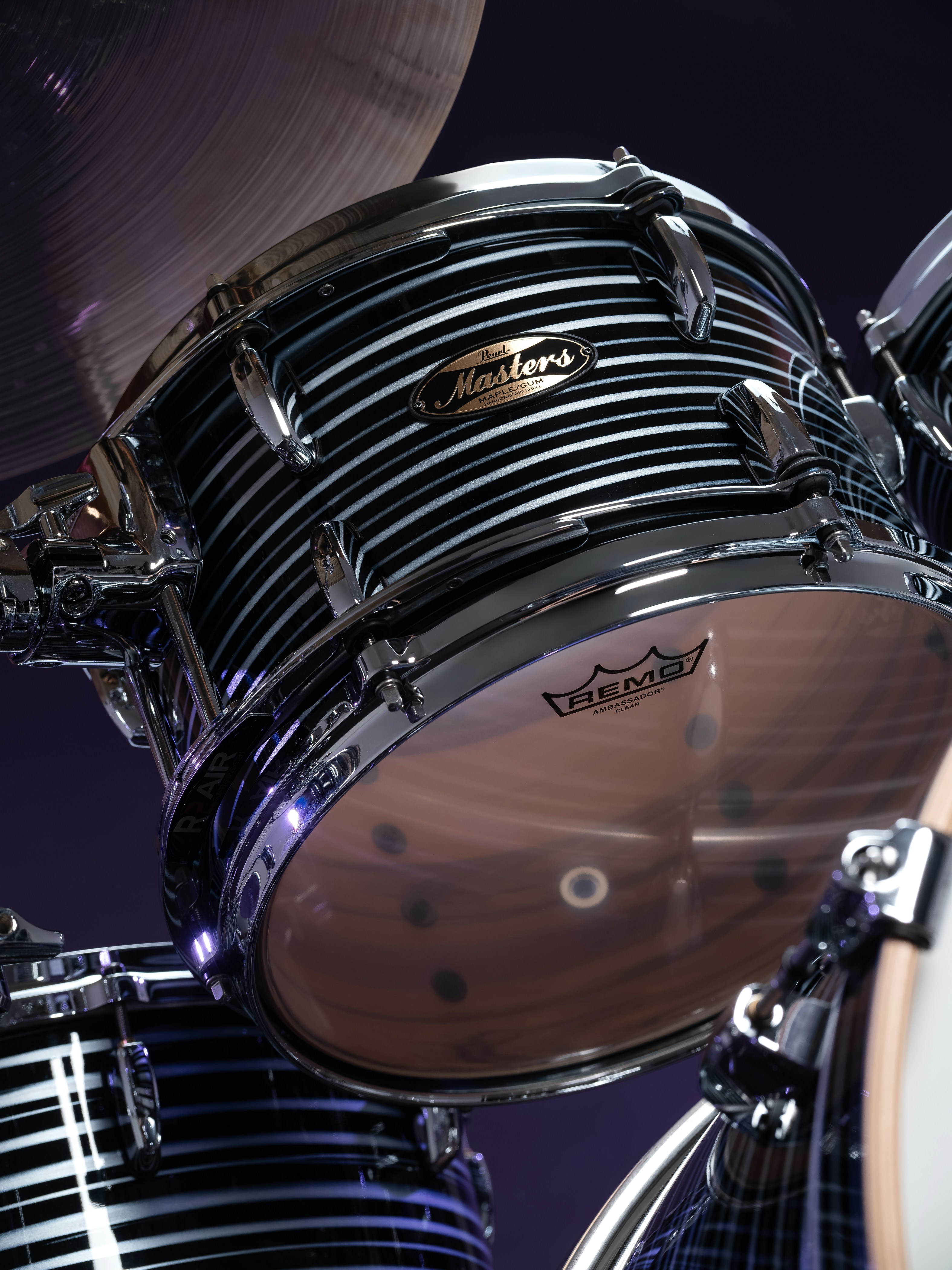 Close-up of a black and silver drum set