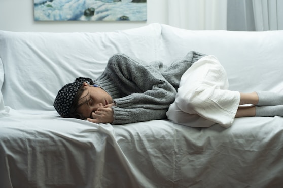 Woman sleeping on a couch