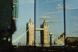 Tower bridge reflected in a window on a sunny day