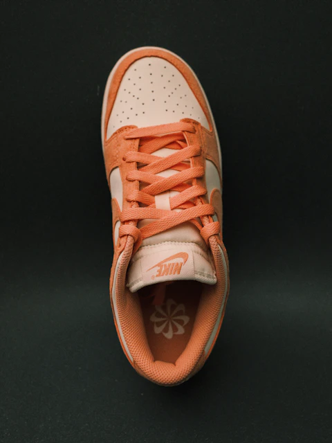 Orange sneaker photographed from above