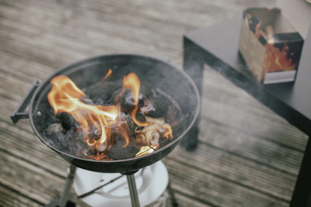 Binchotan charcoal glowing bright in the grill