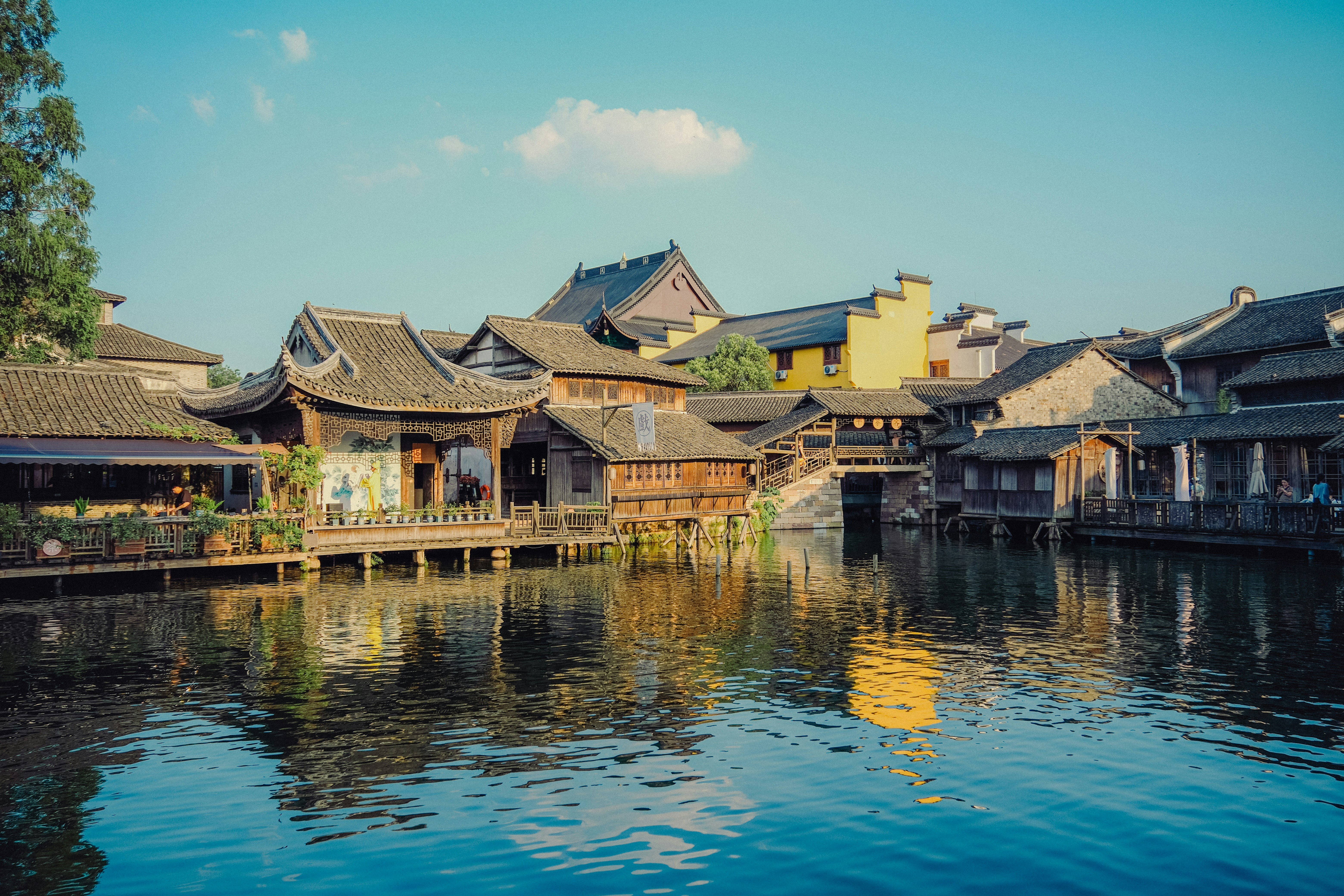 Traditional buildings reflected in a calm canal
