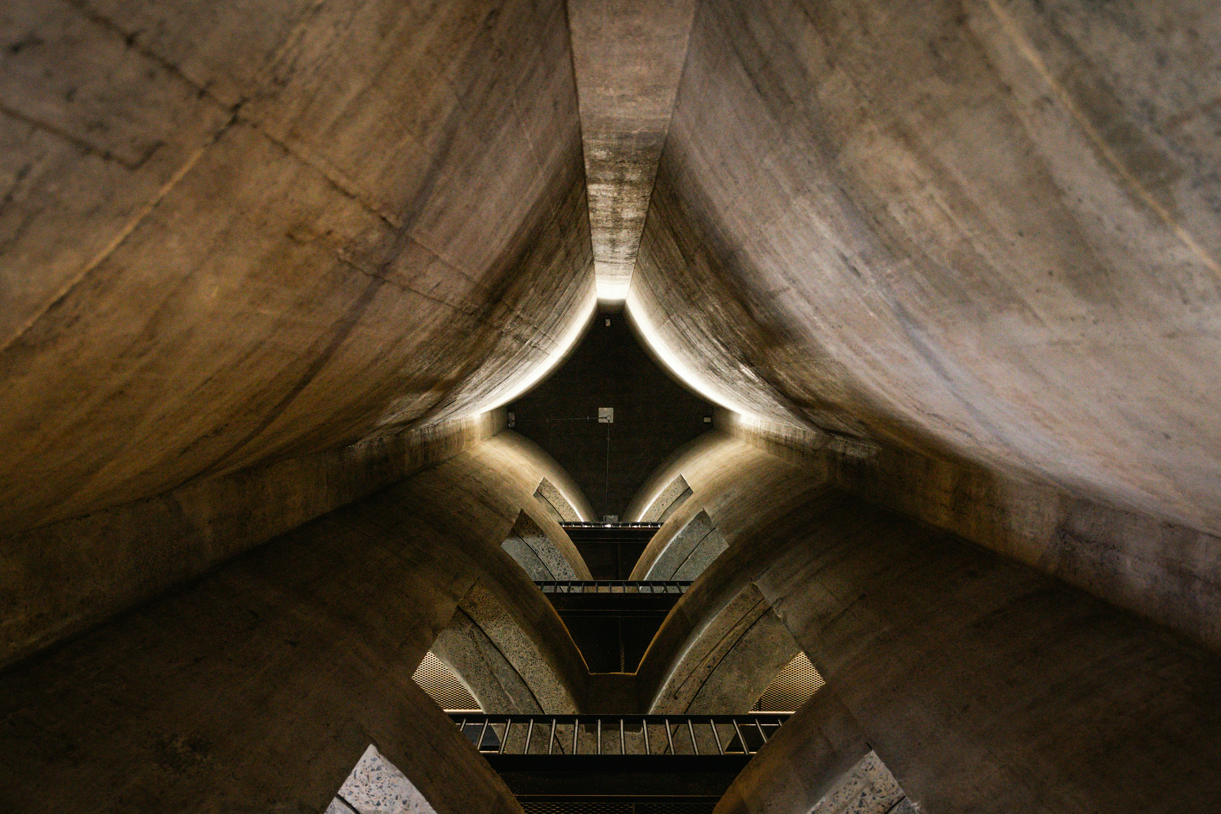 Geometric concrete structure with dramatic lighting