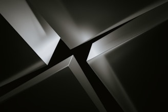 Abstract geometric shapes with dramatic lighting and shadows