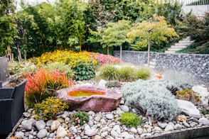 A beautifully landscaped garden with a water feature
