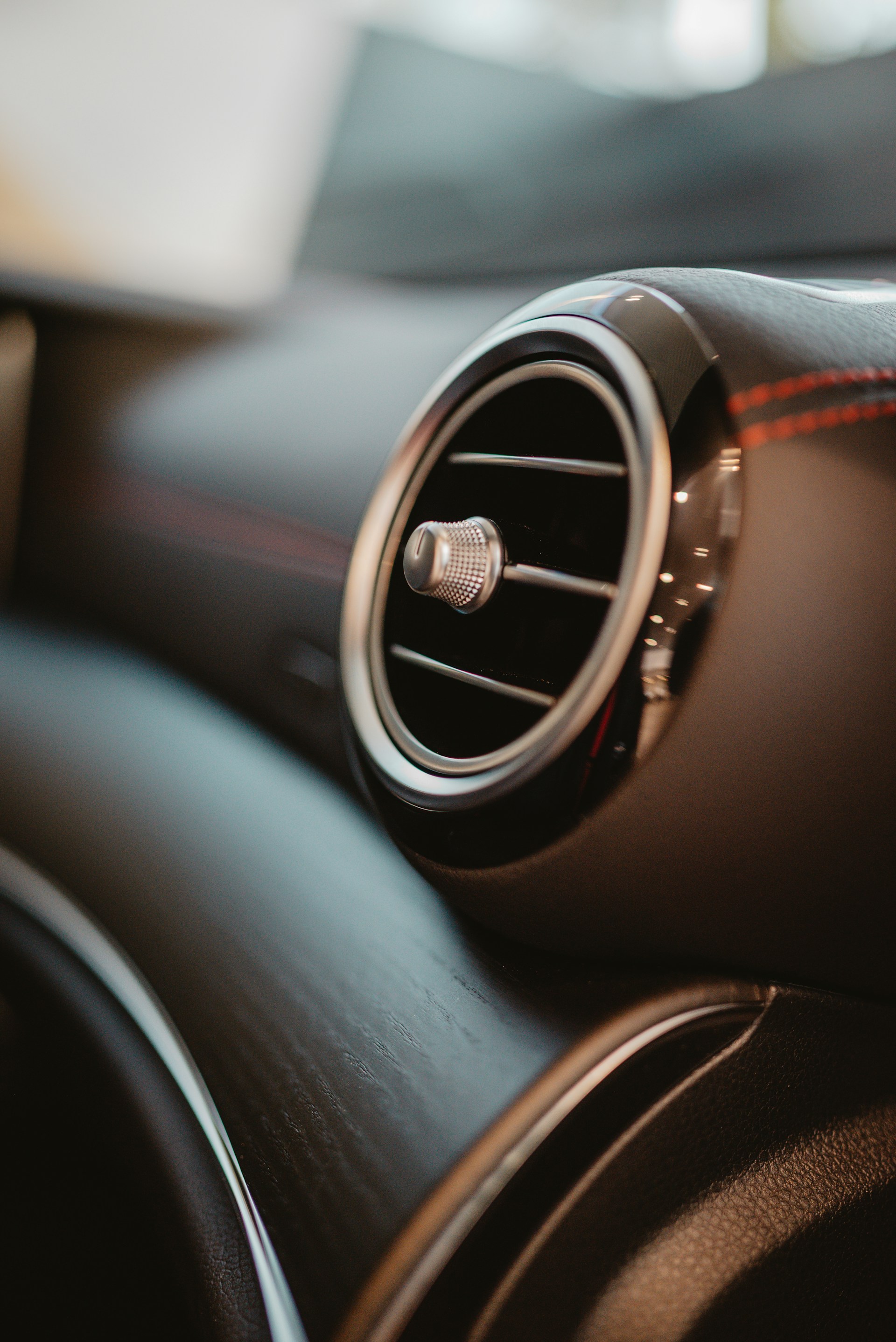 Close-up of a car's interior air vent.