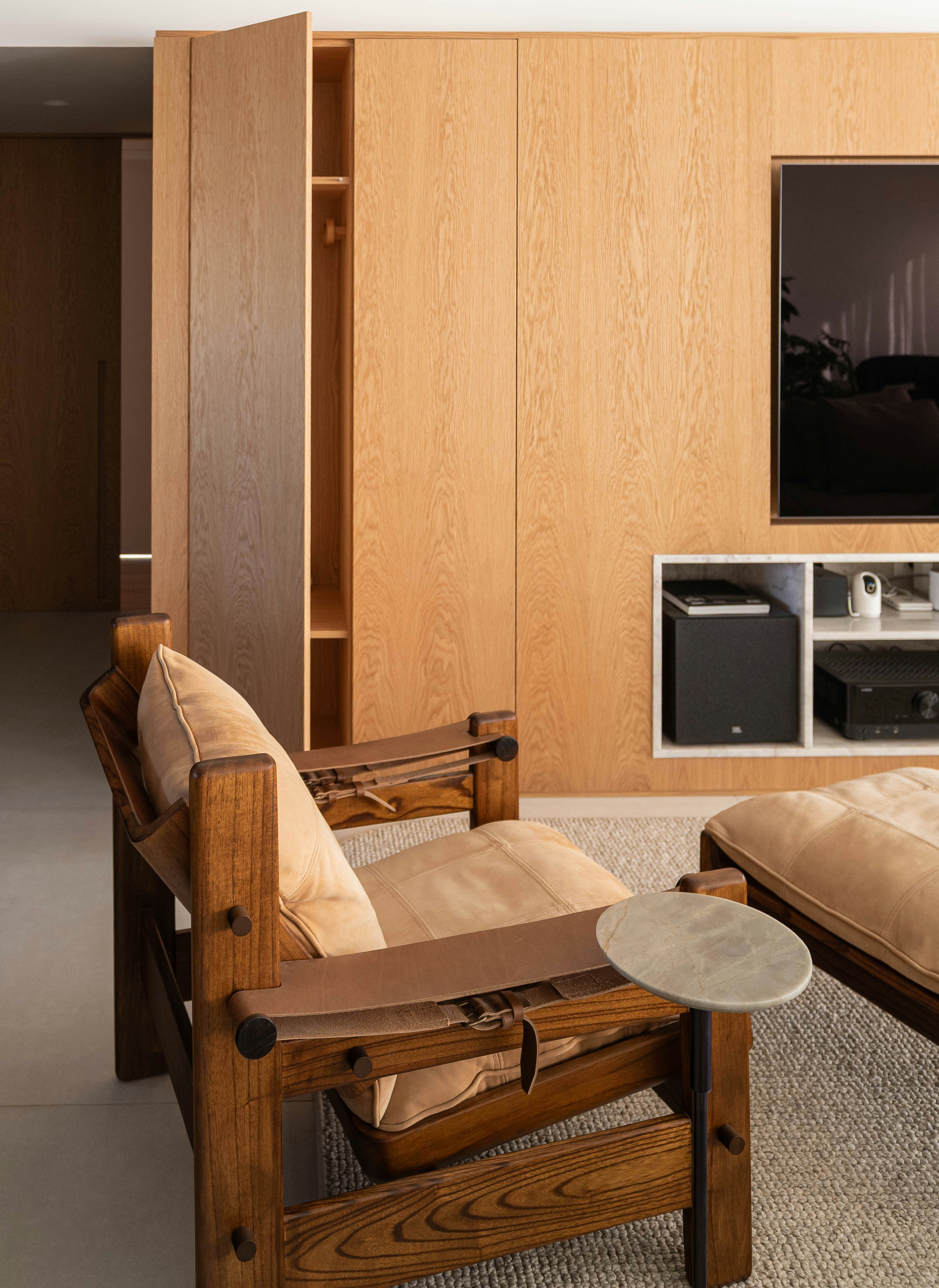 Modern hotel room with multifunctional furniture
