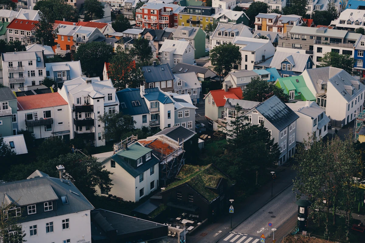 Colourful houses and corrugated roofs across a residential Reykjavík neighbourhood