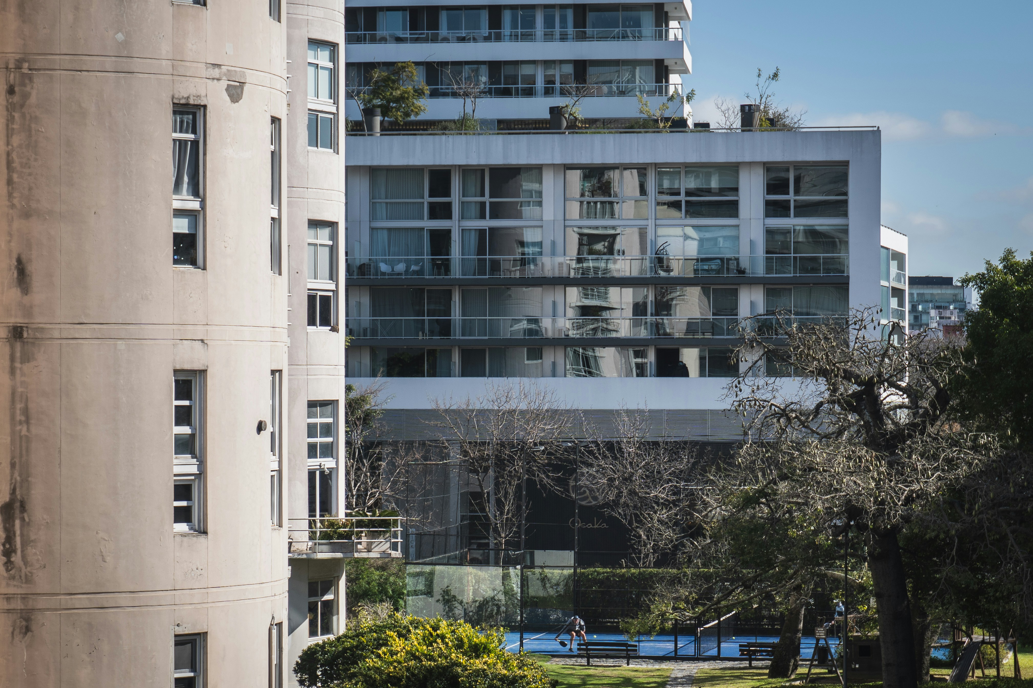 New residential development with balconies and vegetation