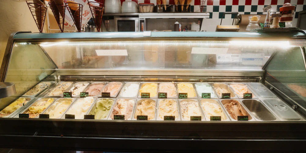 Display case filled with colorful gelato flavors