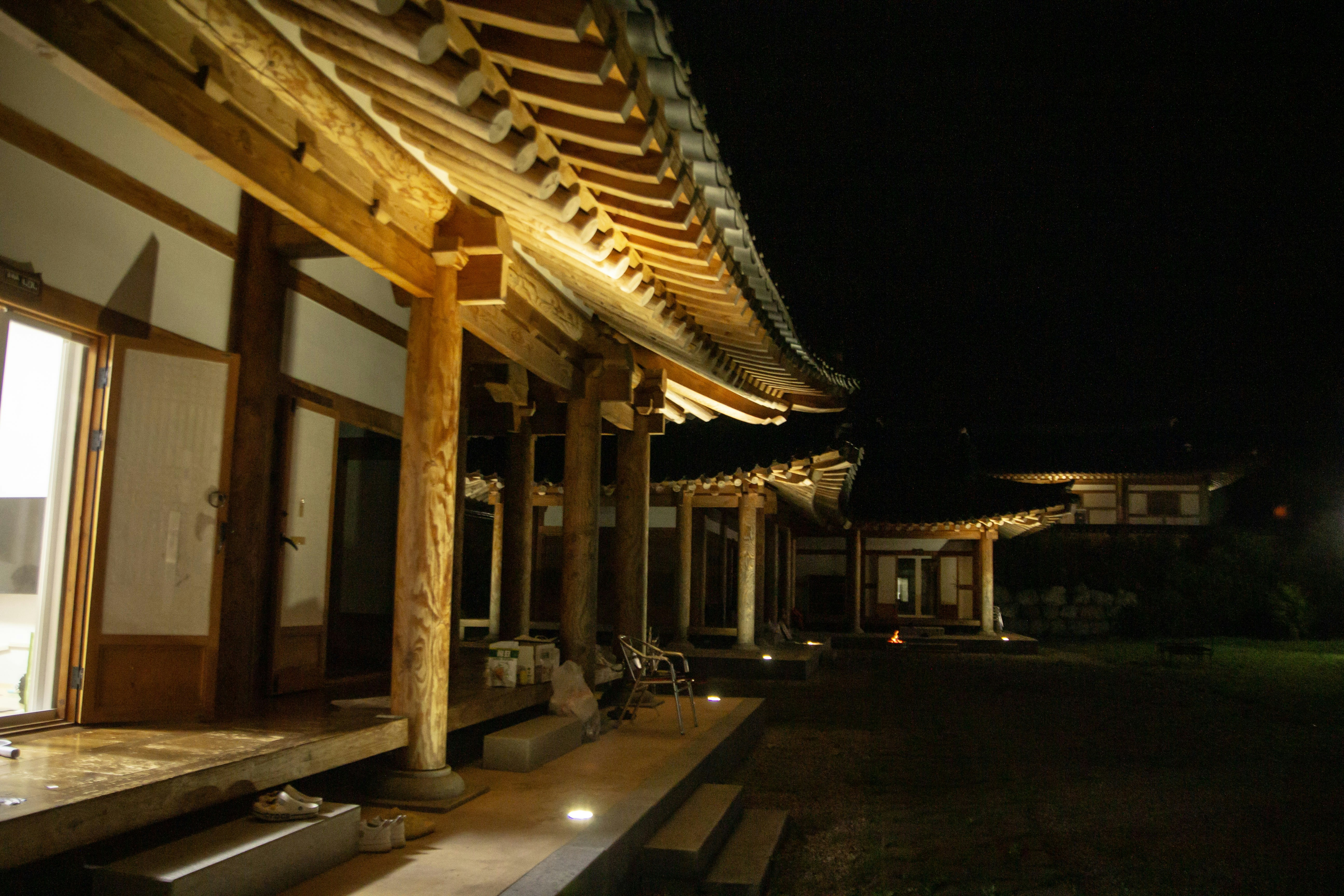 Traditional temple illuminated at night