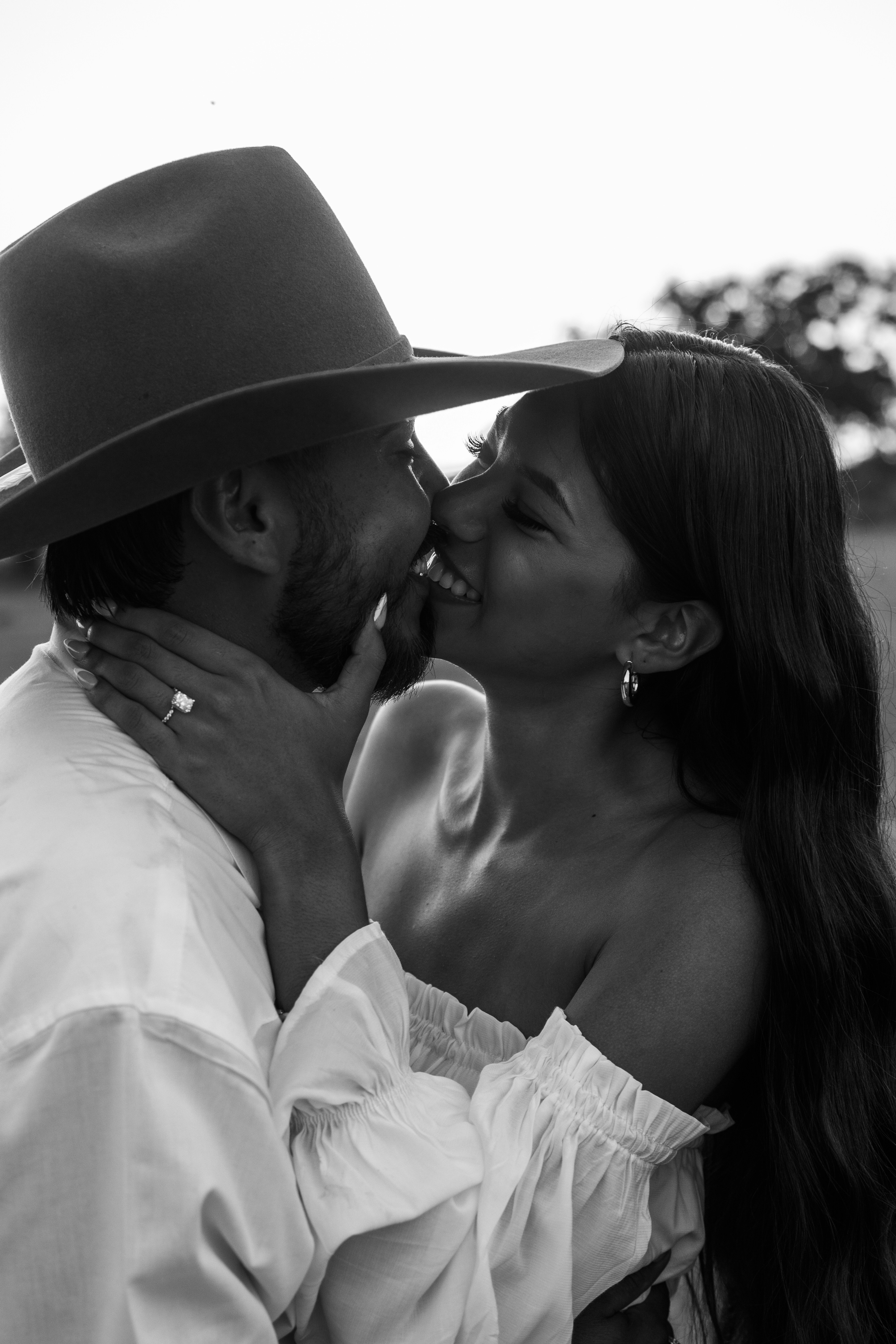 Couple sharing a tender moment outdoors