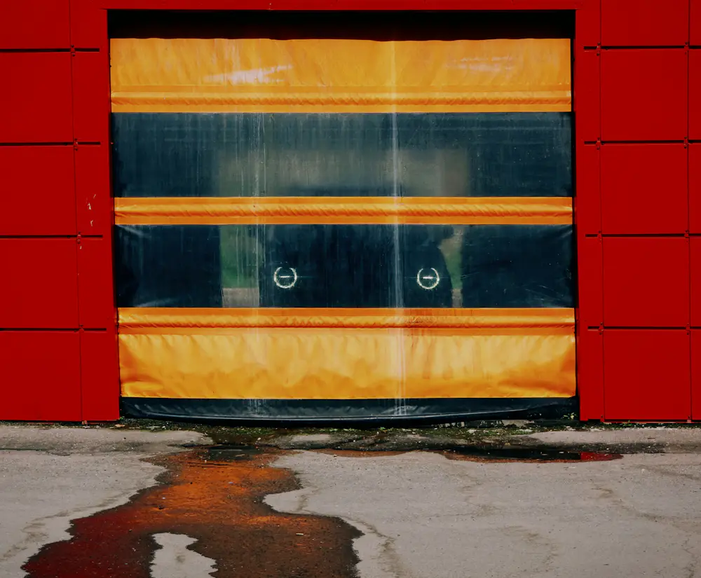 High-speed fabric door opening inside an industrial cold storage facility