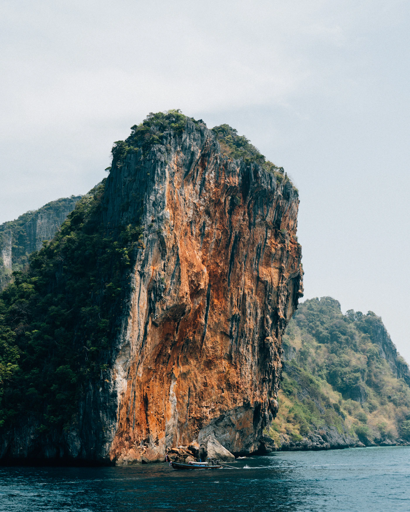 Limestone cliffs rising from turquoise water at Ko Phi Phi, Thailand