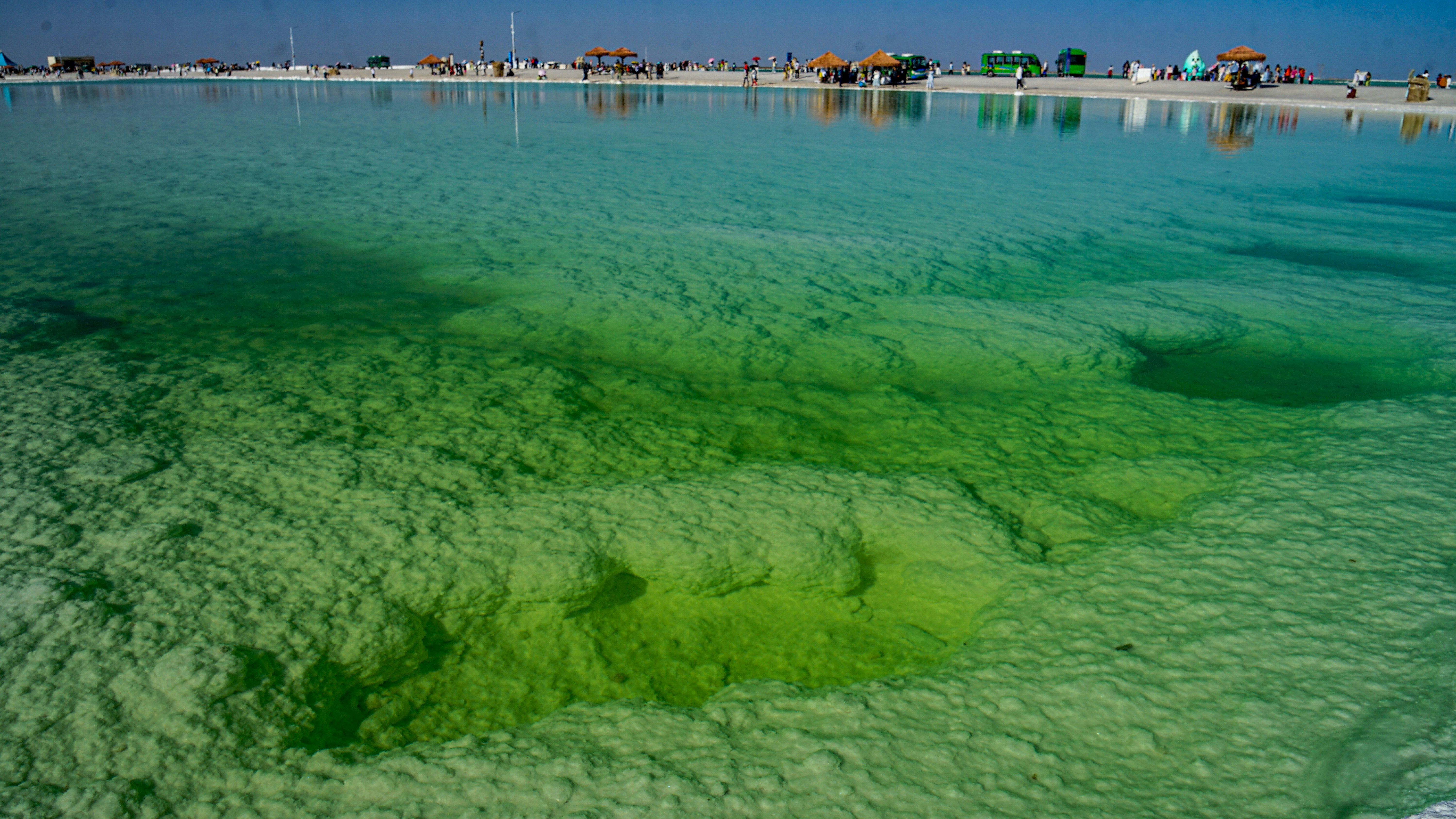 Clear shallow turquoise water with sandy bottom