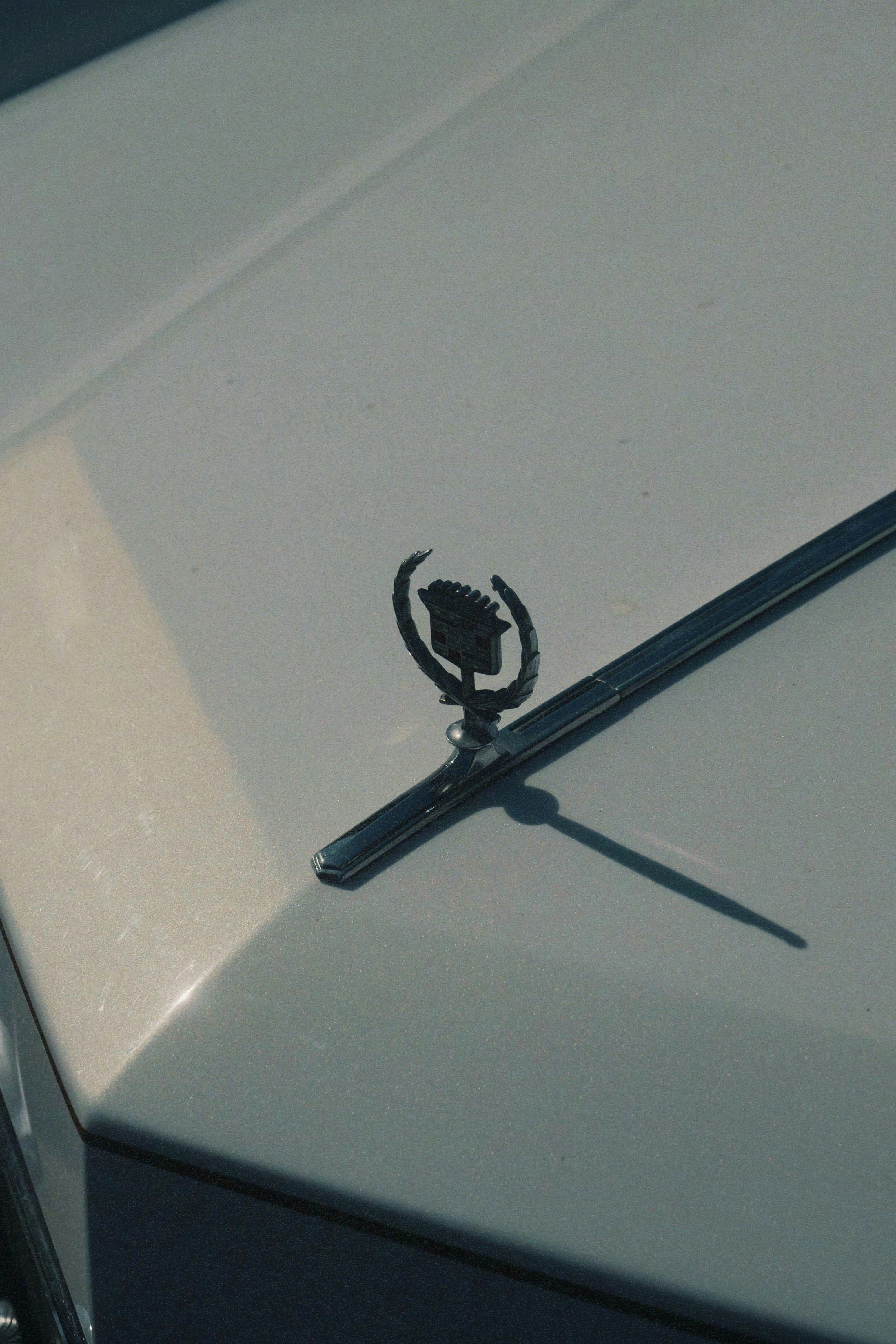 Cadillac hood ornament on a vintage car