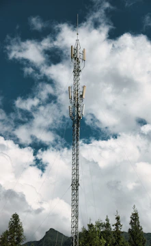Cell tower against a dramatic cloudy sky