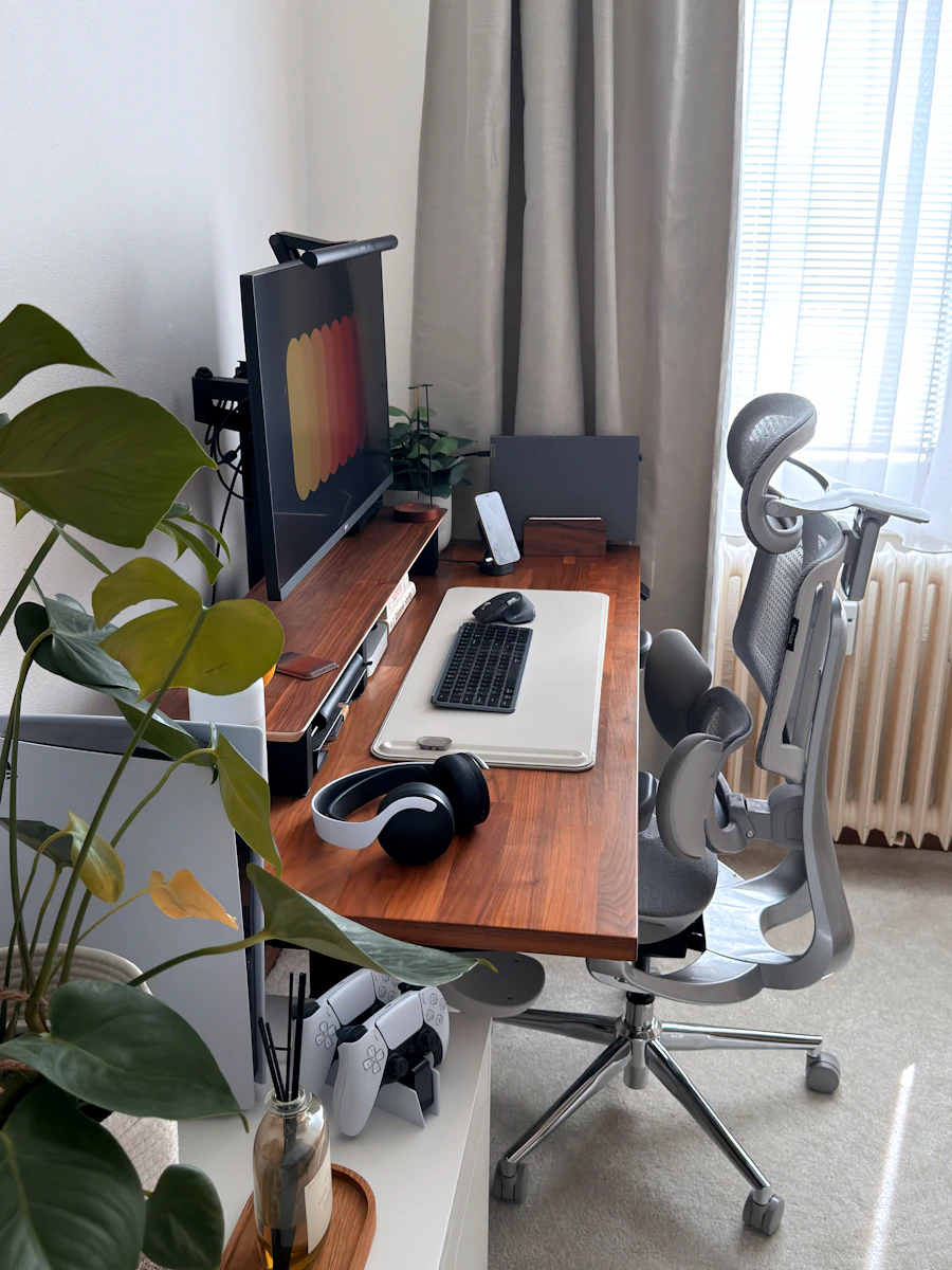 Open desk workspace with a laptop