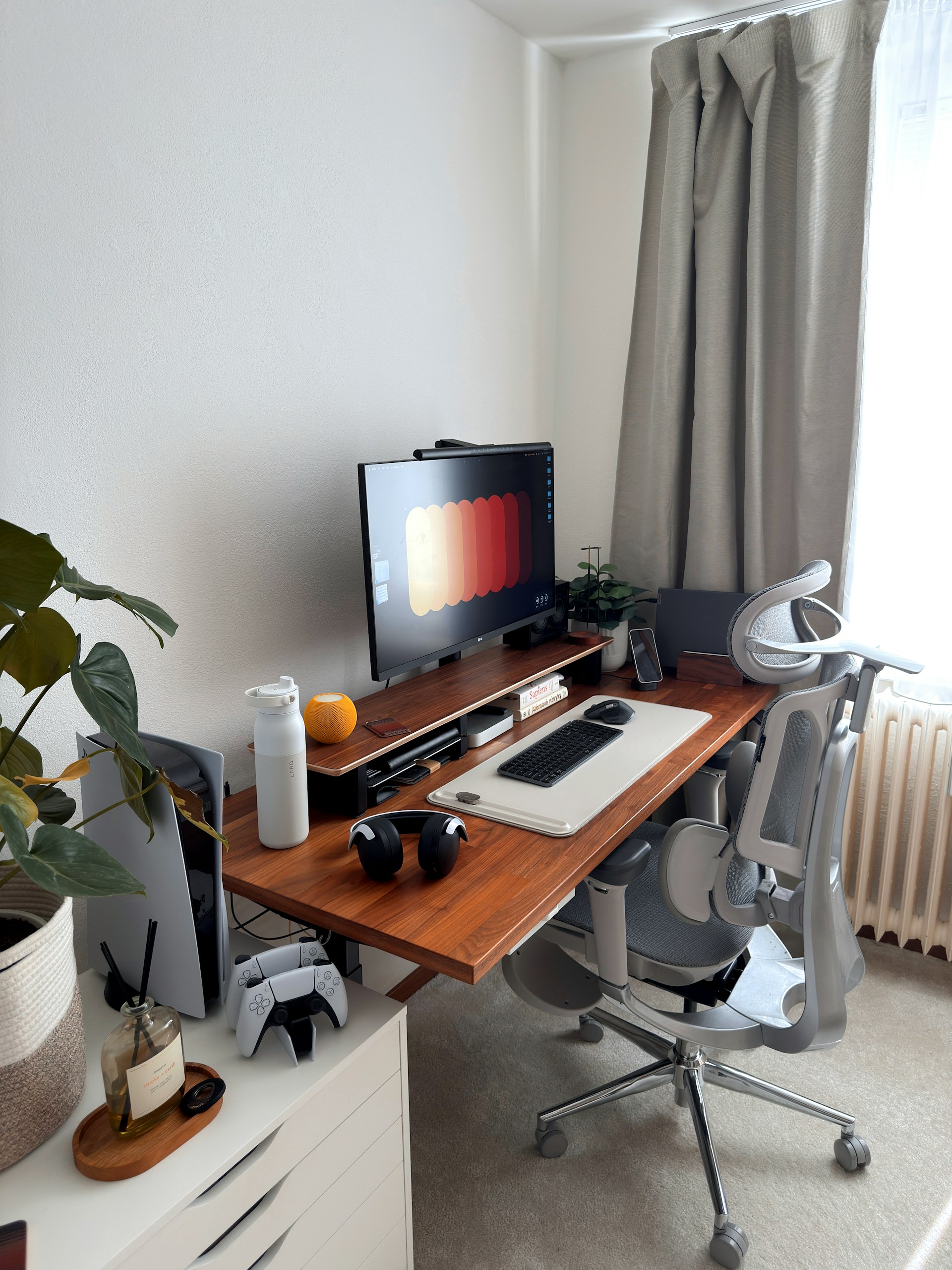 A modern gaming setup with a computer and console.