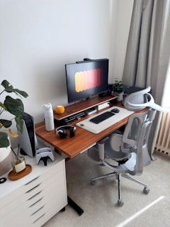 Modern computer desk setup with gaming accessories