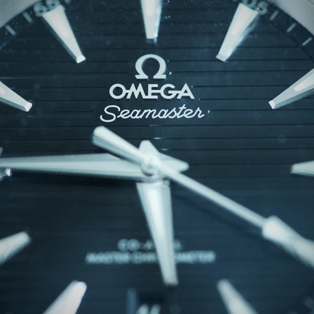 Close-up of the blue face of an Omega Seamaster watch