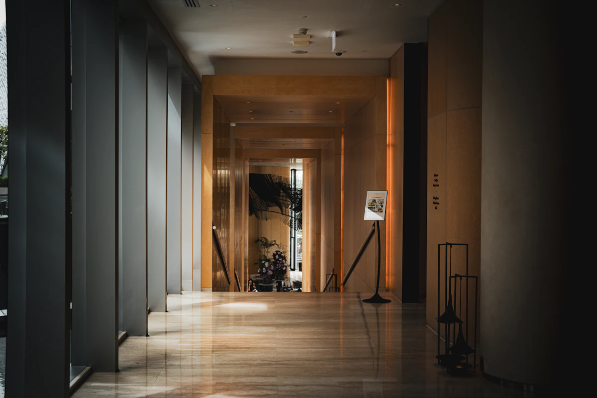 A modern, minimal hotel corridor
