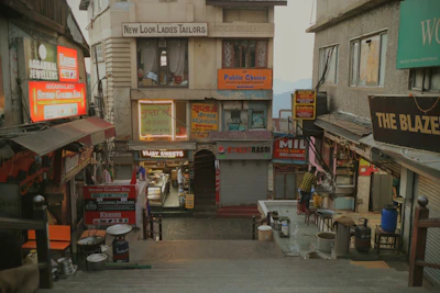 Busy street scene with shops and signs