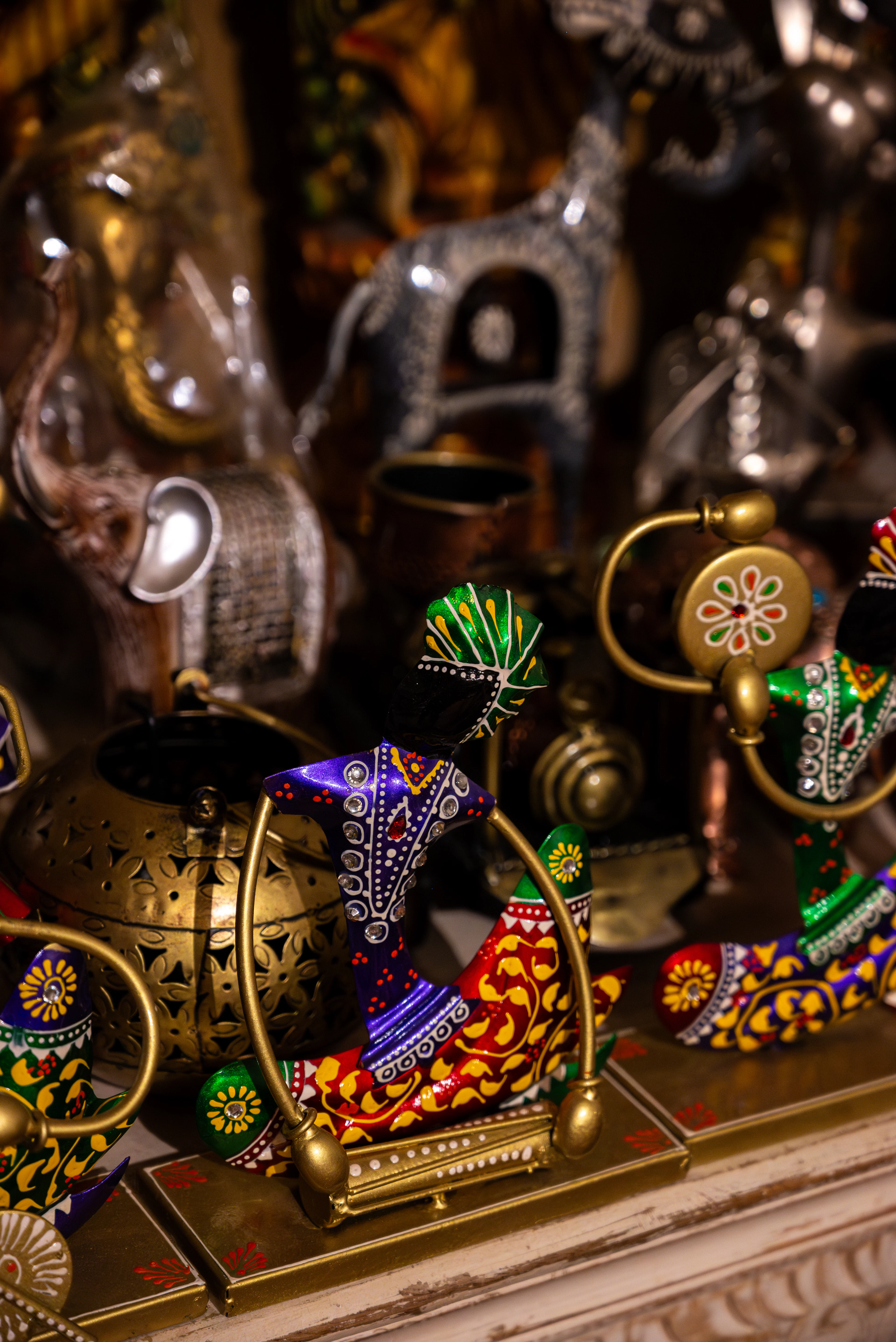 Ornate metal handicrafts on display