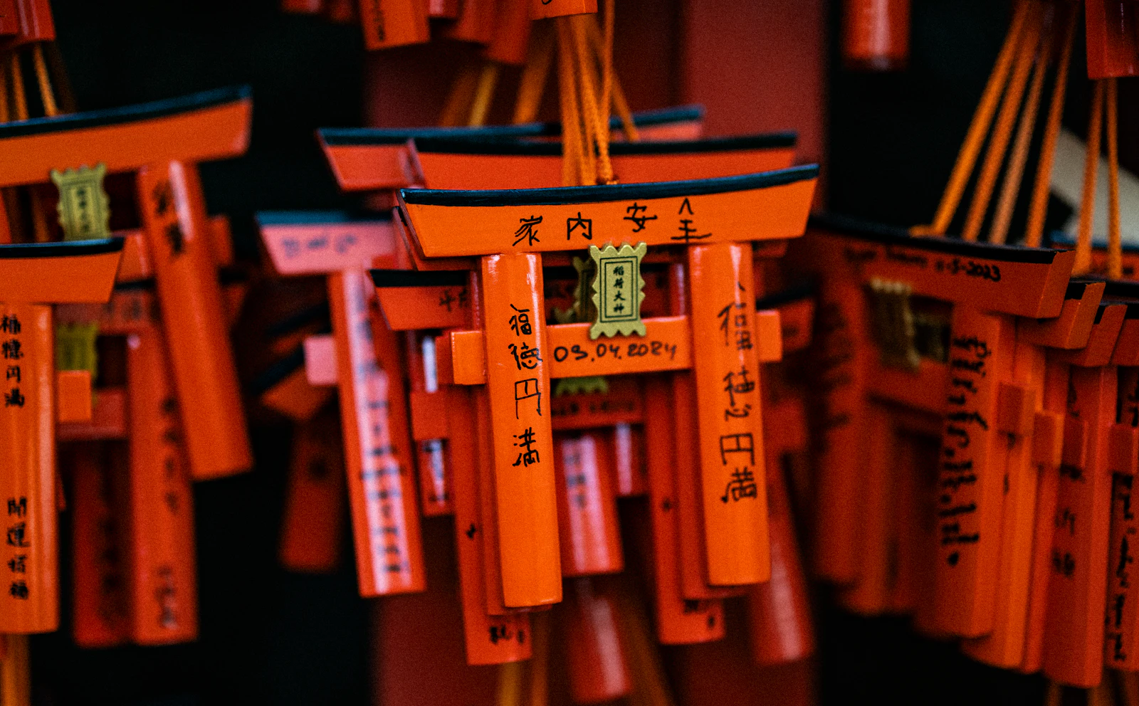 Rows of vibrant orange torii gates in Kyoto, Japan