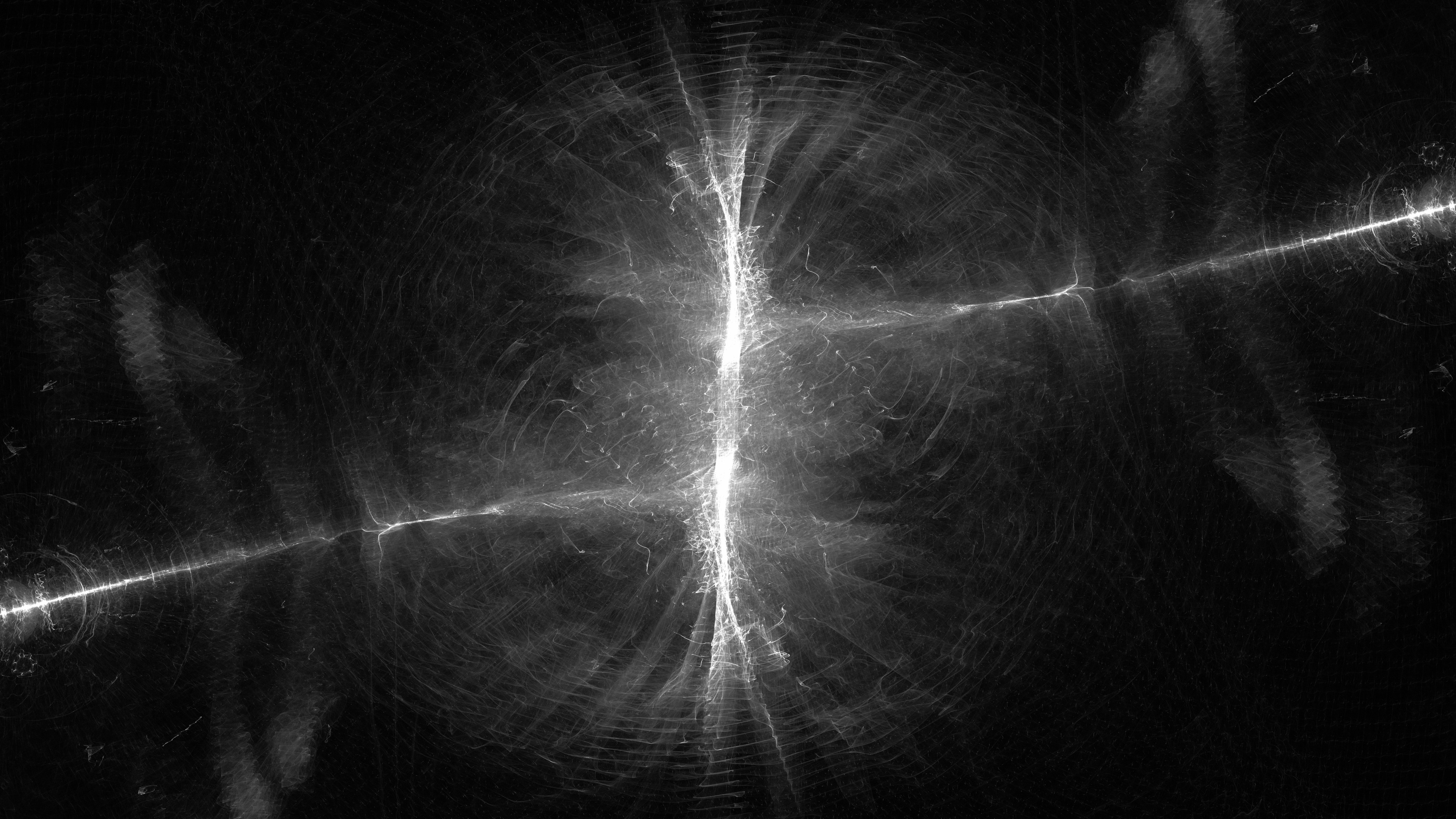 Abstract white light trails against black background