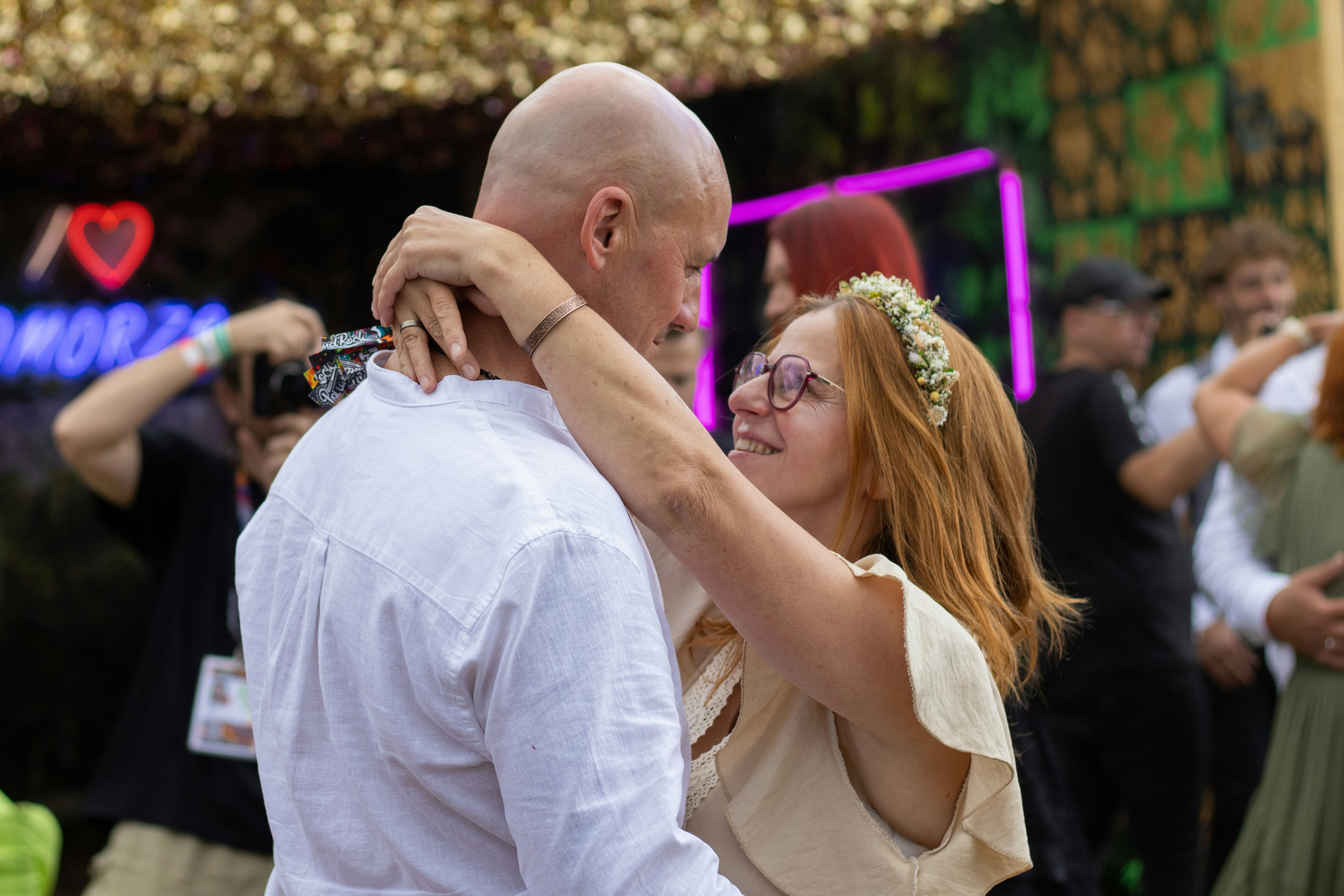 Couple dancing together at an outdoor event