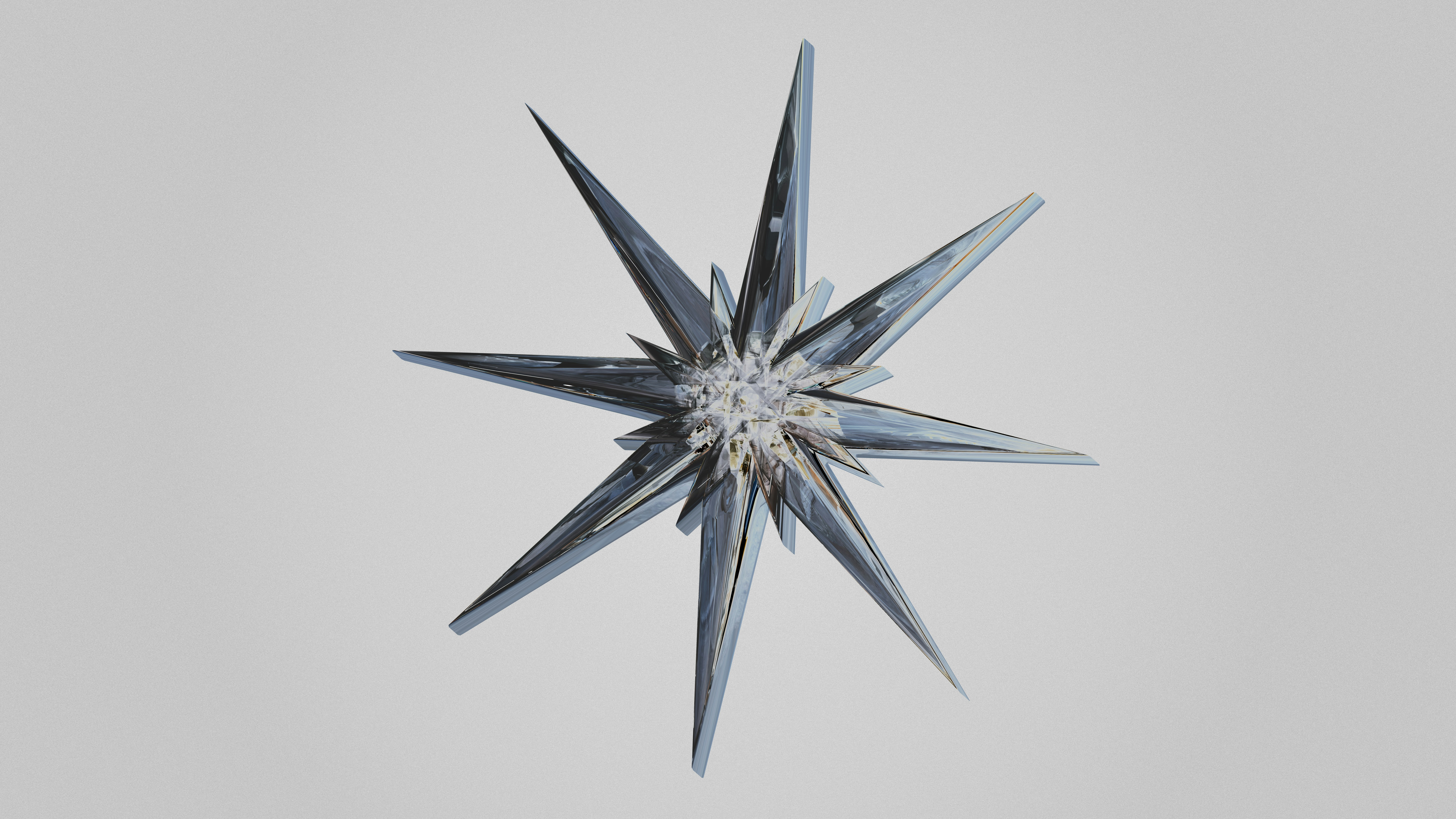 A detailed star-shaped ice crystal on a white background