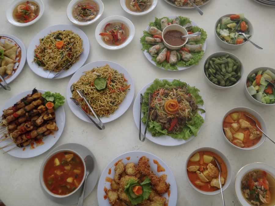 A table filled with assorted Thai dishes