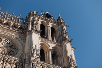 Gothic cathedral architecture against a clear blue sky