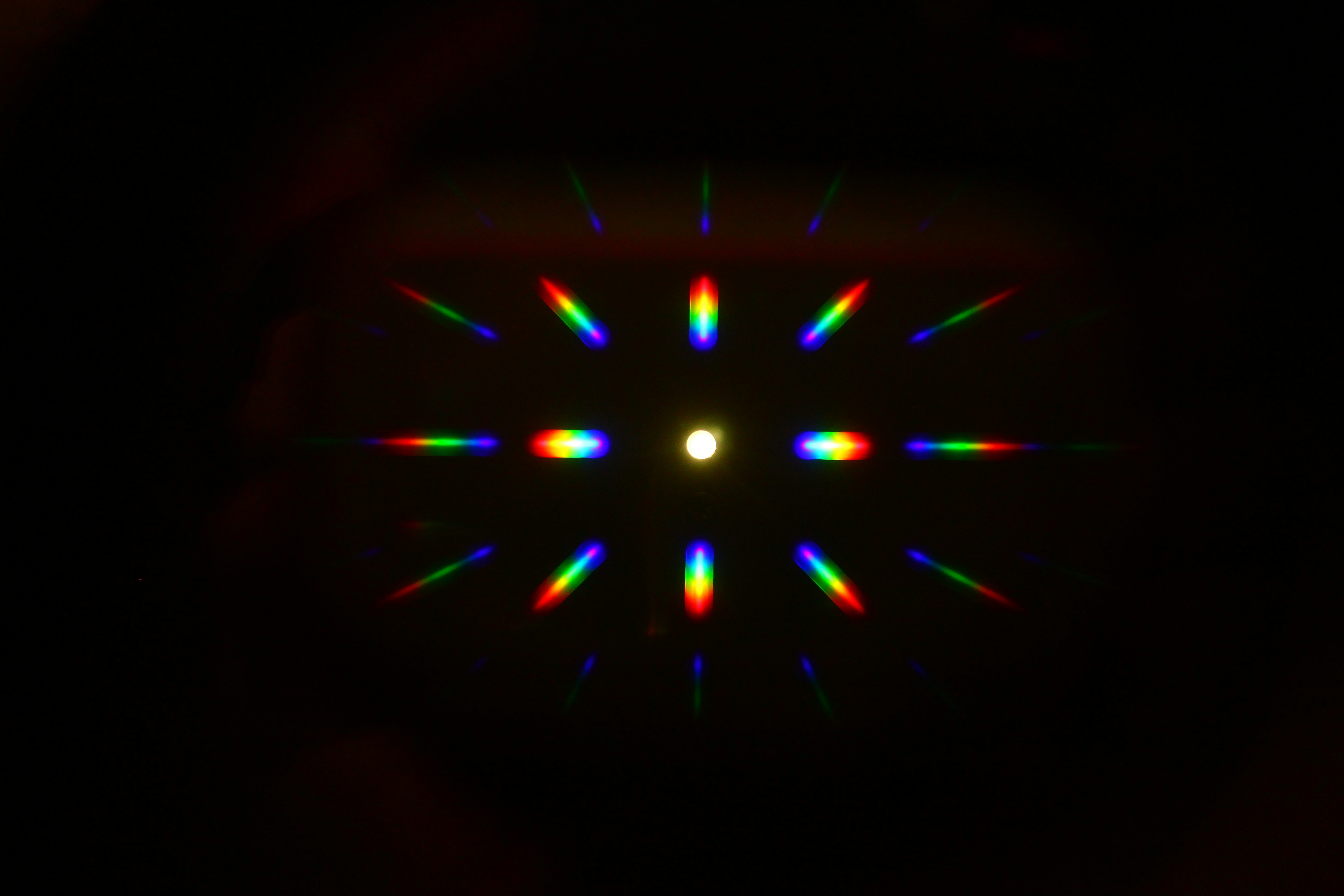 Colorful light spectrum pattern radiating from center