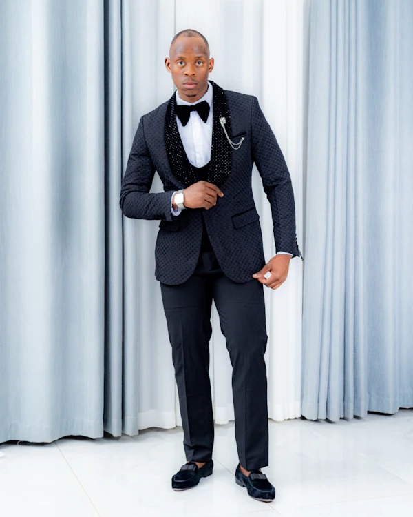 Formal black tuxedo, an example of black-tie-optional attire for gentlemen