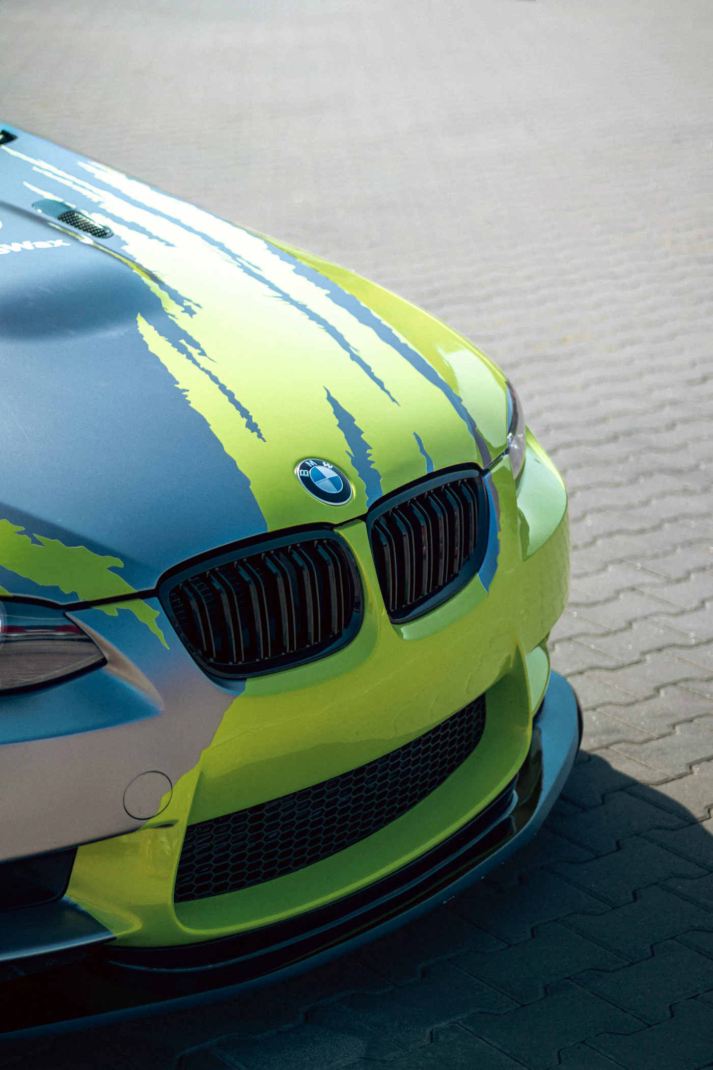 BMW with yellow racing stripe detail