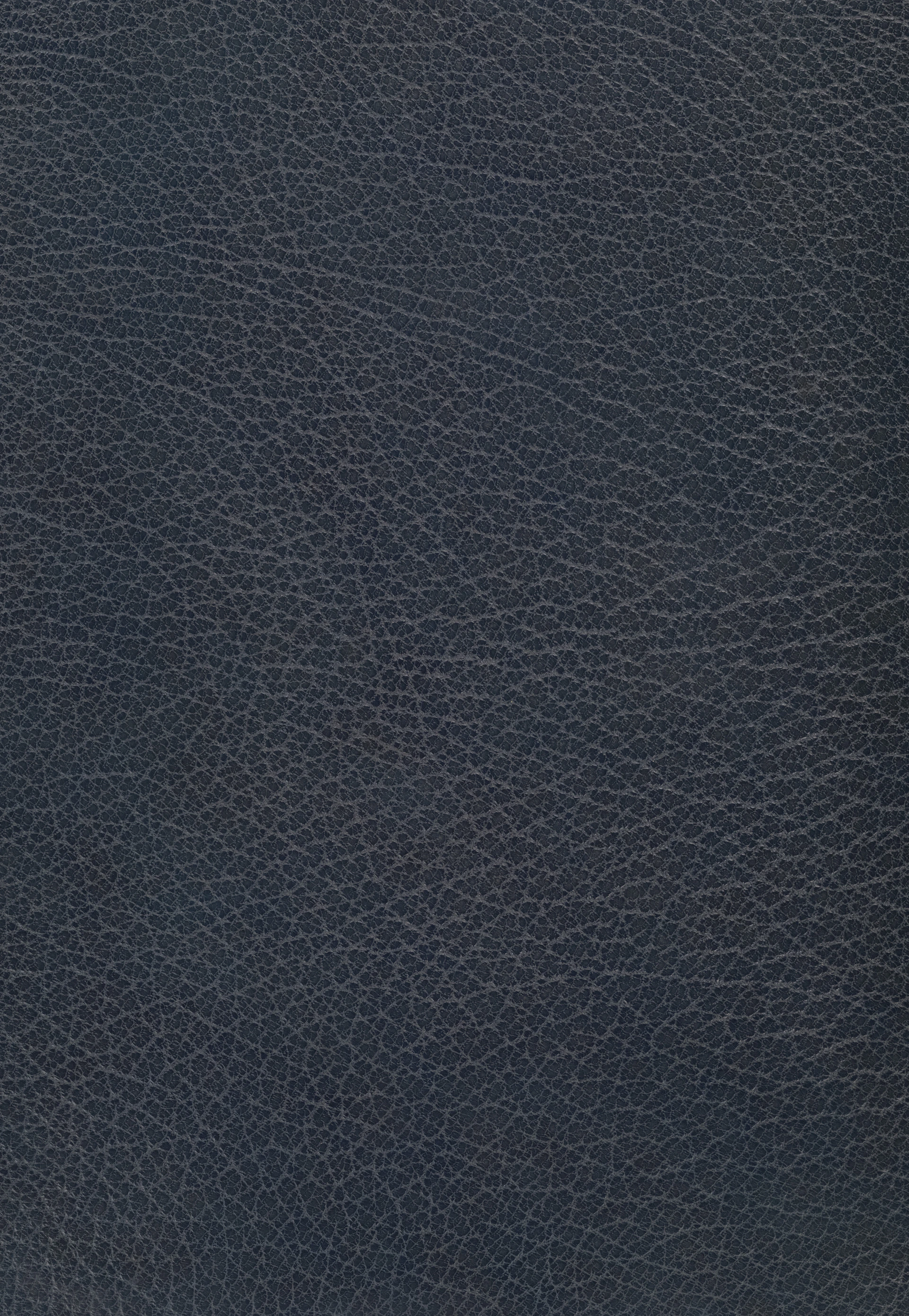 Dark blue textured leather surface