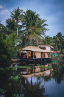 Houseboat moored on a tranquil tropical waterway