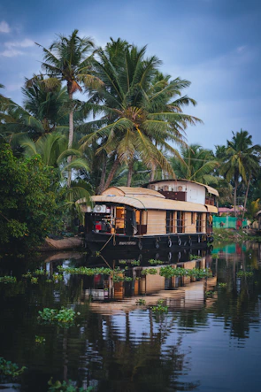 Houseboat moored on a tranquil tropical waterway