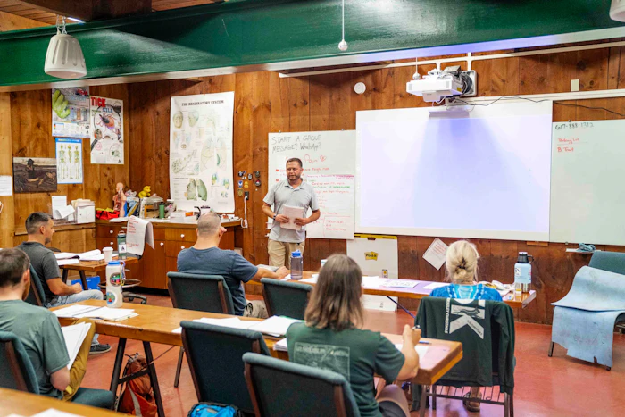 Instructor presenting to students in a classroom
