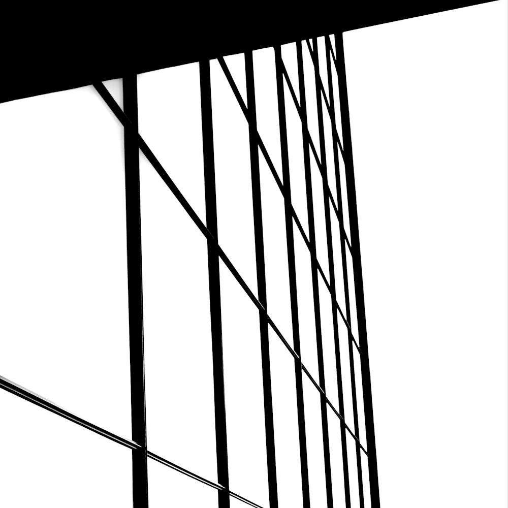 Minimalist black and white detail of a modern glass office facade