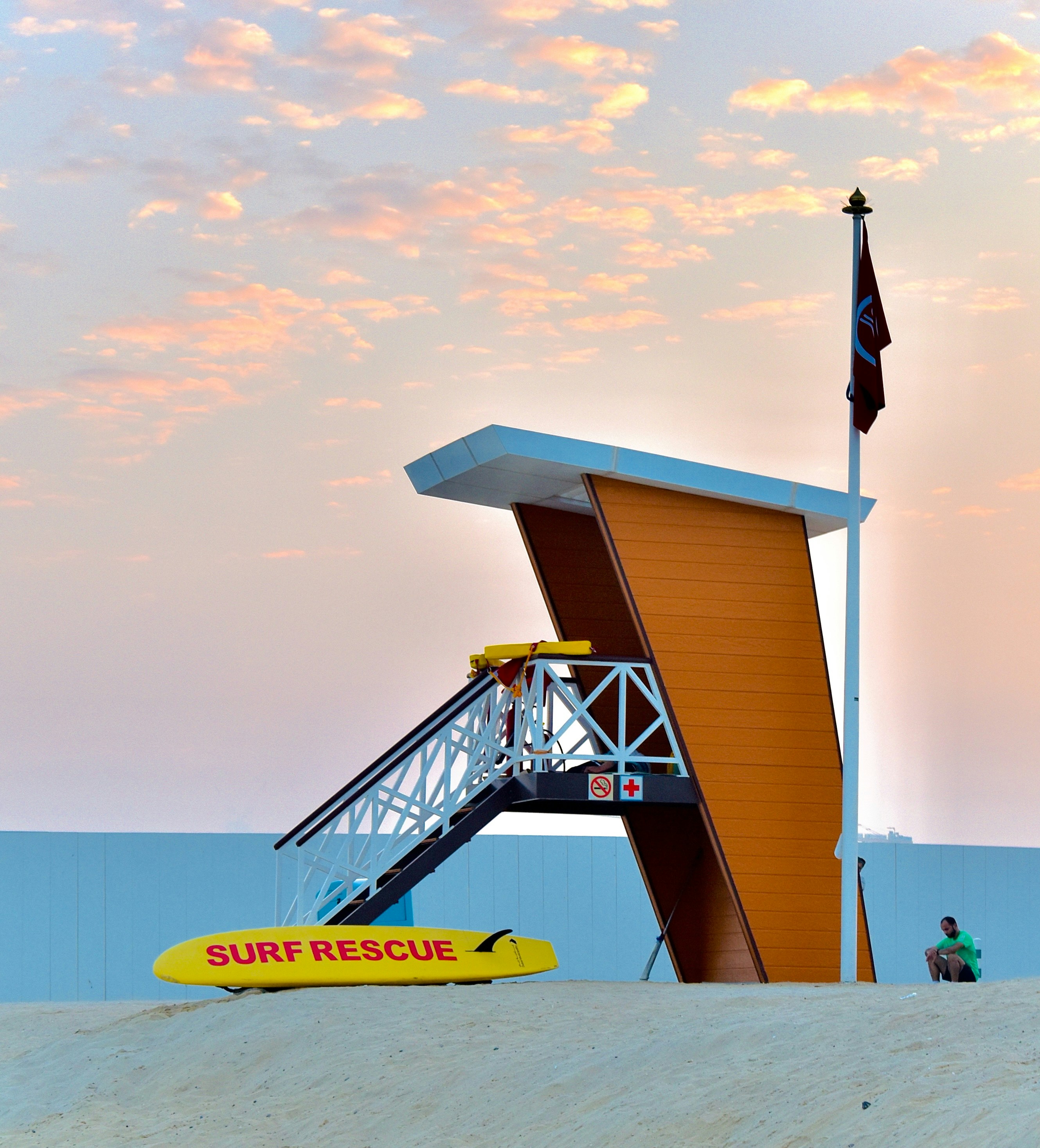 Lifeguard tower with surf rescue board on beach photo – Free Beach ...
