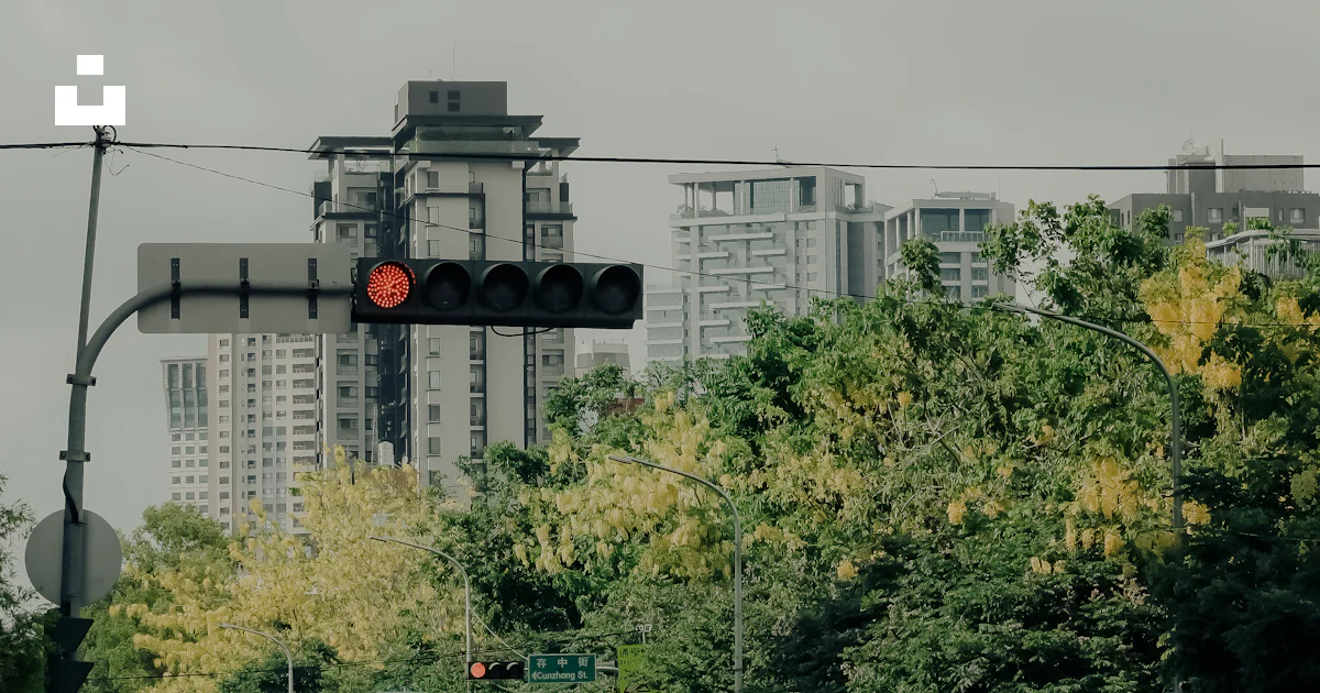 Motorcycle Intersection Motorcycles and cars at a city intersection with traffic light. photo ...